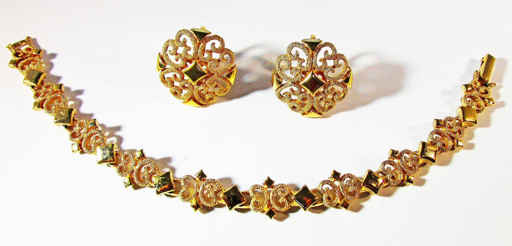 Avon 1960s Mid-Century Wardrobe Friendly Gold Tone Filigree Set - Front